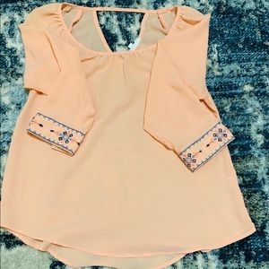 3/4 length sheet peach shirt